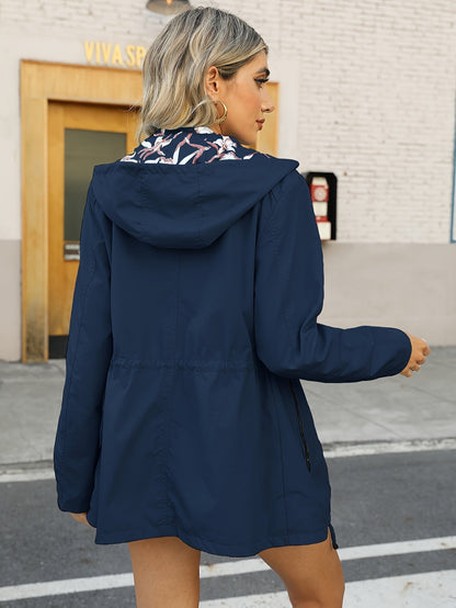 Damen Regenjacke mit Kapuze und Blumenmuster Futter in Schwarz