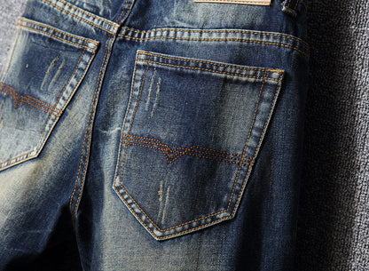 Herren Zerrissene Denim-Jeans mit lässigem Schnitt in Vintageblau