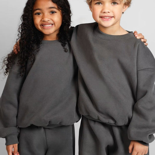 Damen bequemer Sweatshirt mit überschnittenen Schultern und hohem Kragen in Aprikose