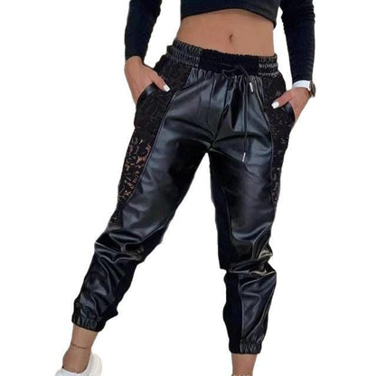 Damen Lässige Jogginghose mit coolen Spitzeinsätzen und elastischem Bund in Schwarz