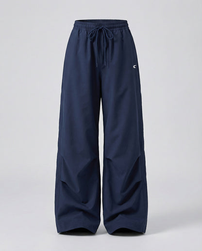 Damen weite Bundhose mit elastischem Tunnelzug langen Schlagbeinen und seitlicher Teilungsnaht in Schwarz