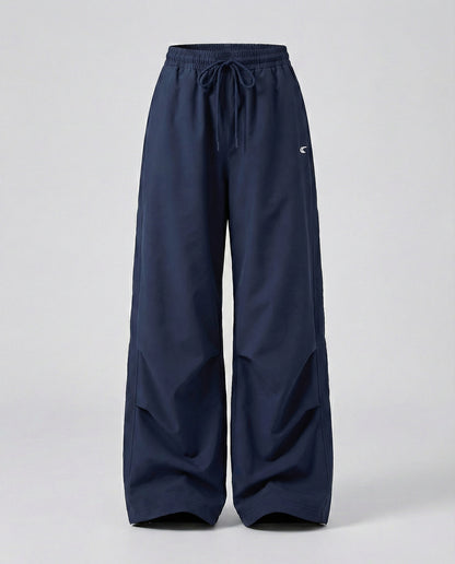 Damen weite Bundhose mit elastischem Tunnelzug langen Schlagbeinen und seitlicher Teilungsnaht in Schwarz