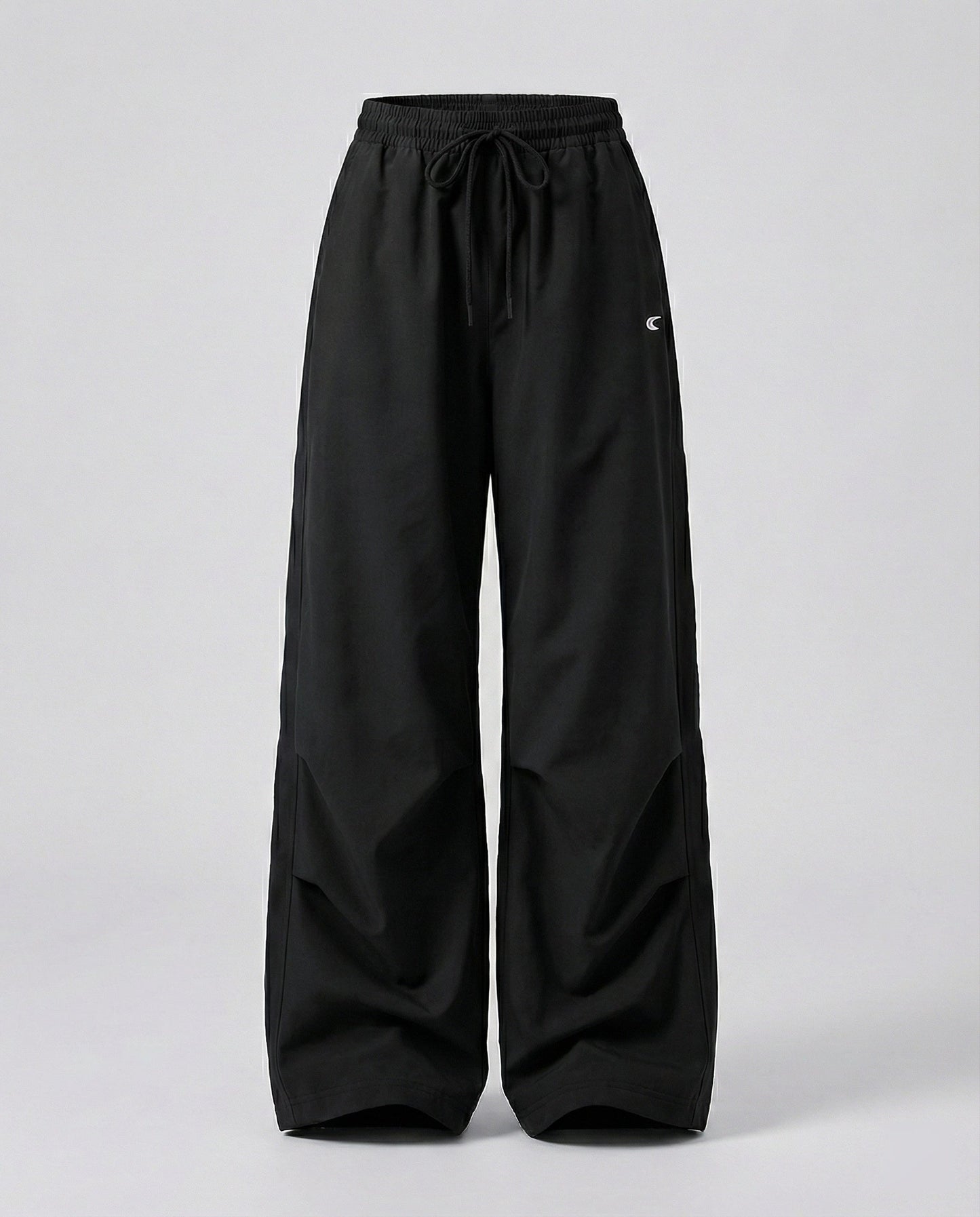 Damen weite Bundhose mit elastischem Tunnelzug langen Schlagbeinen und seitlicher Teilungsnaht in Schwarz