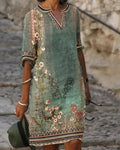 Damen Kleid mit V-Ausschnitt und floralem Ornamentmuster